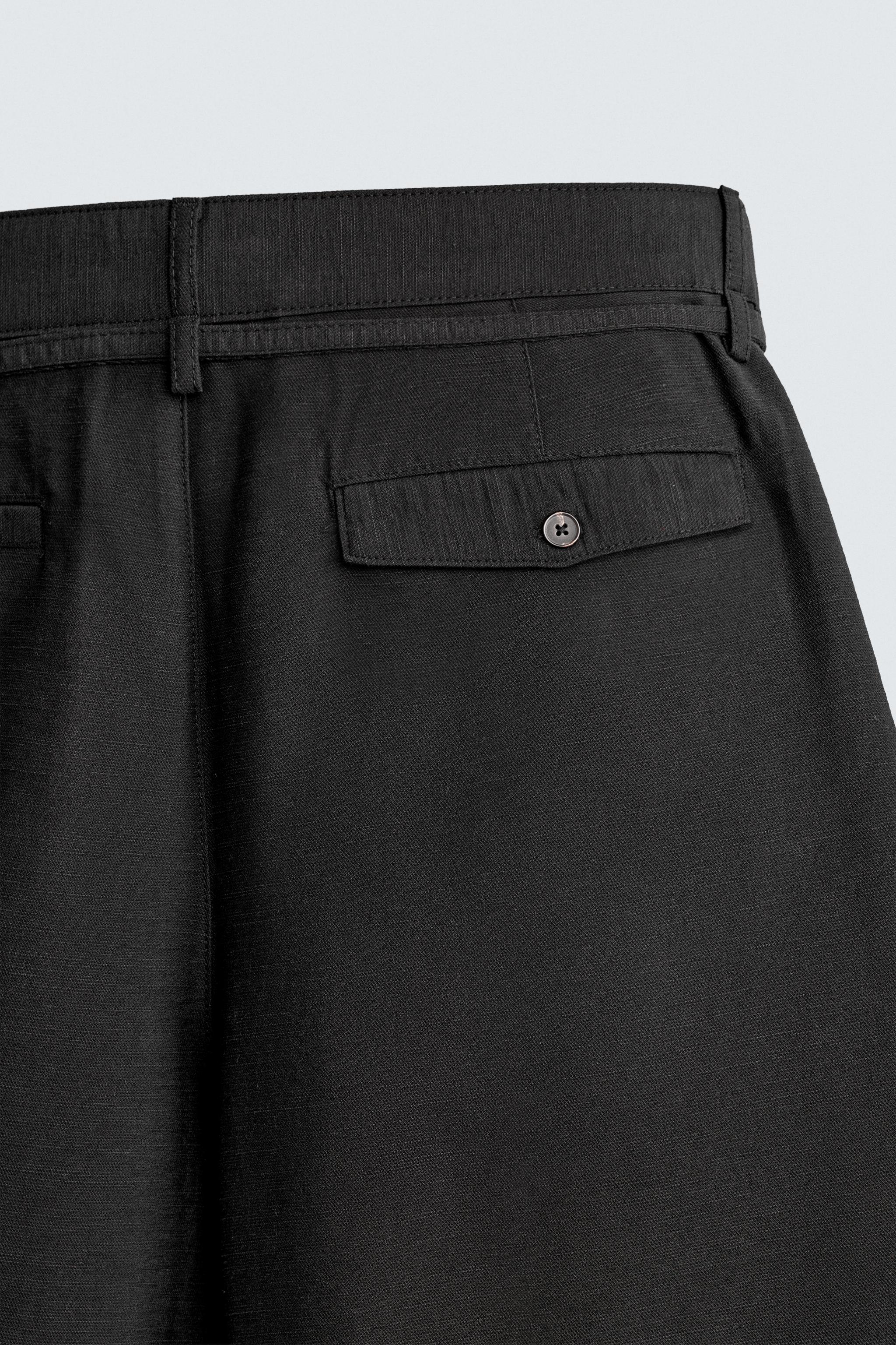 RELAXED FIT BELTED PLEATED SHORTS